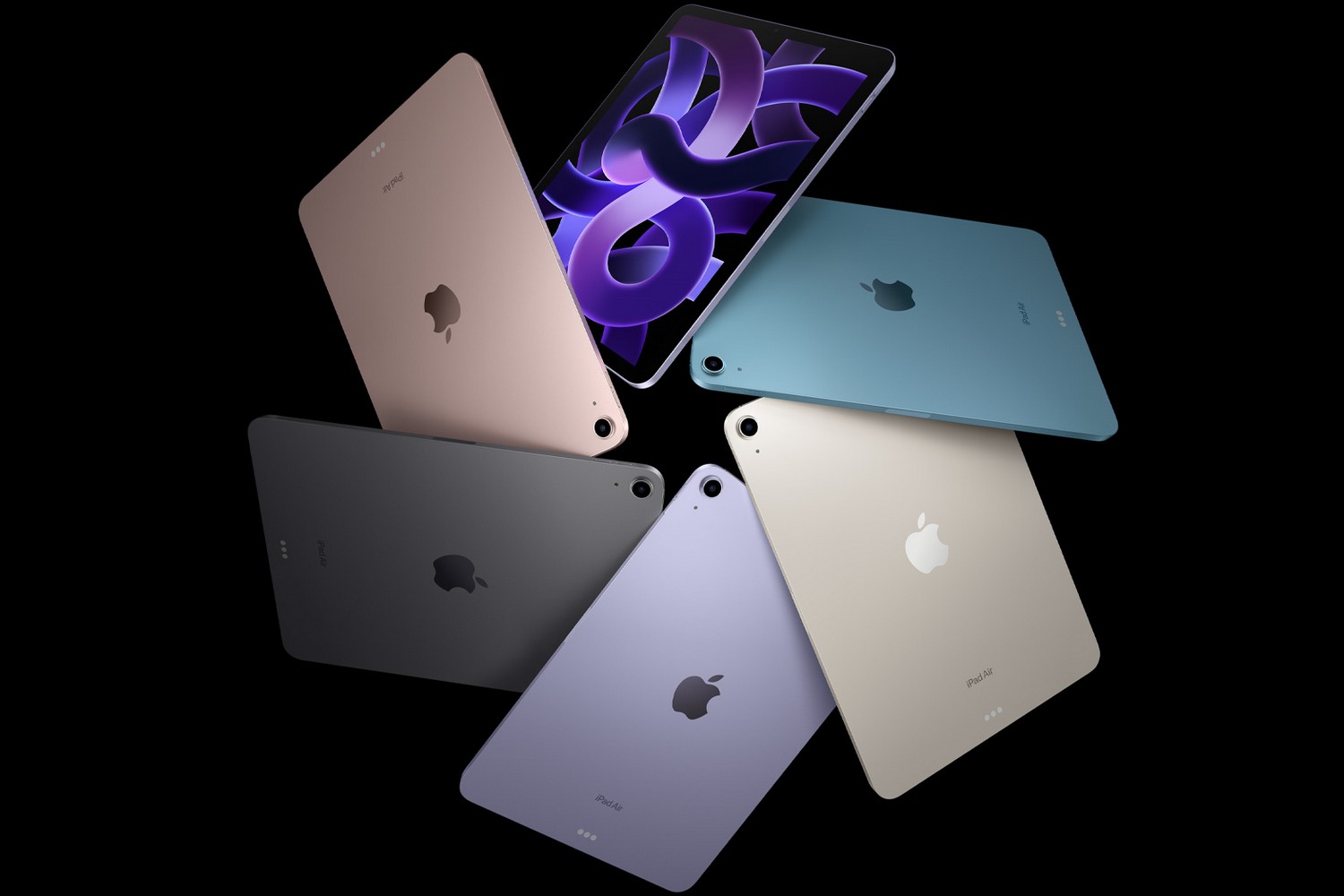 Six Apple iPad Air 5s fanned out in a circle, showing off the various colors of the chassis.