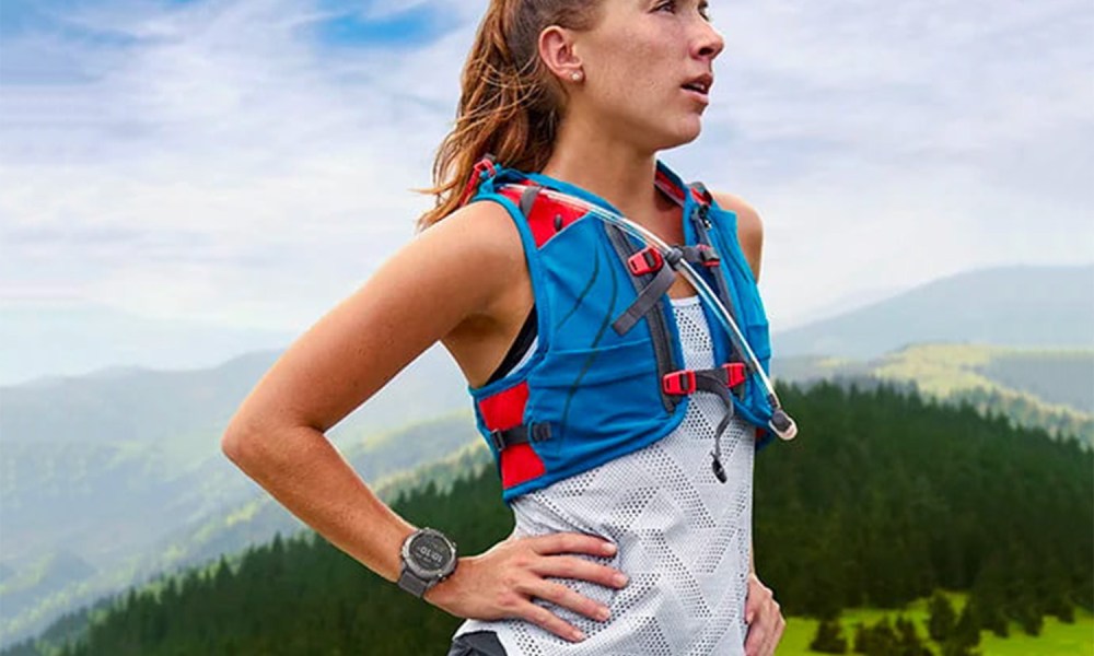 Woman wearing a Garmin watch.