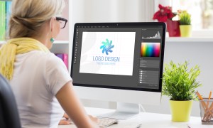 A graphic designer using an image editing program.