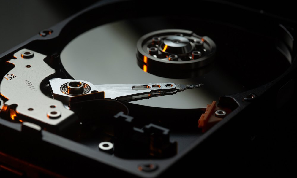 A hard disk drive that showcases the inner components.