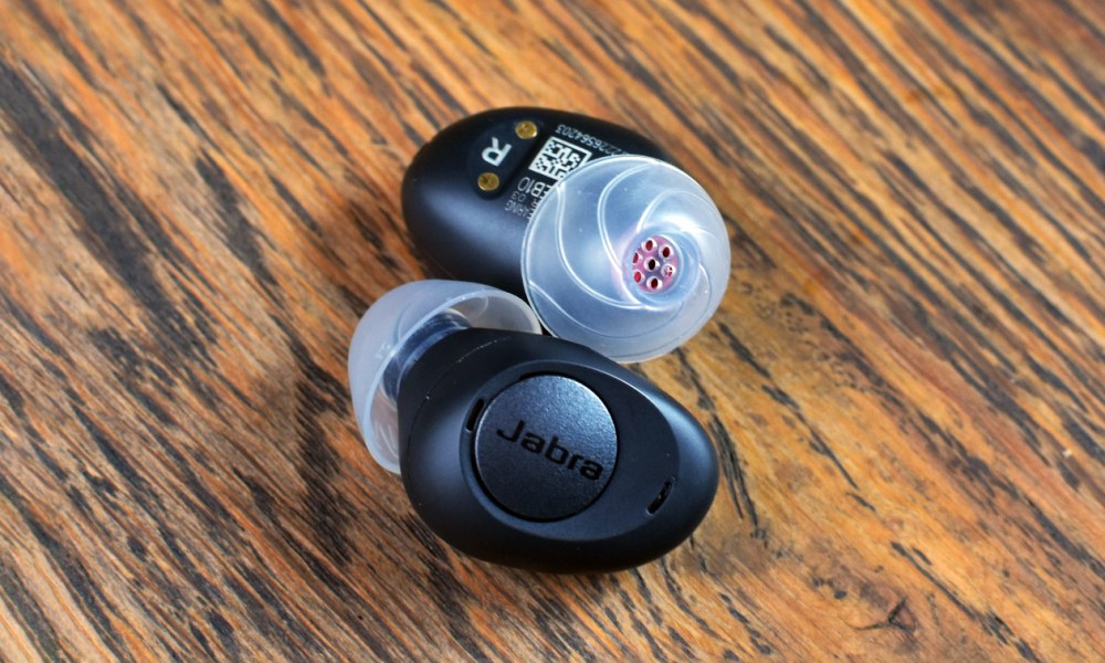 The Jabra Enhance Plus earbuds snap together magnetically.