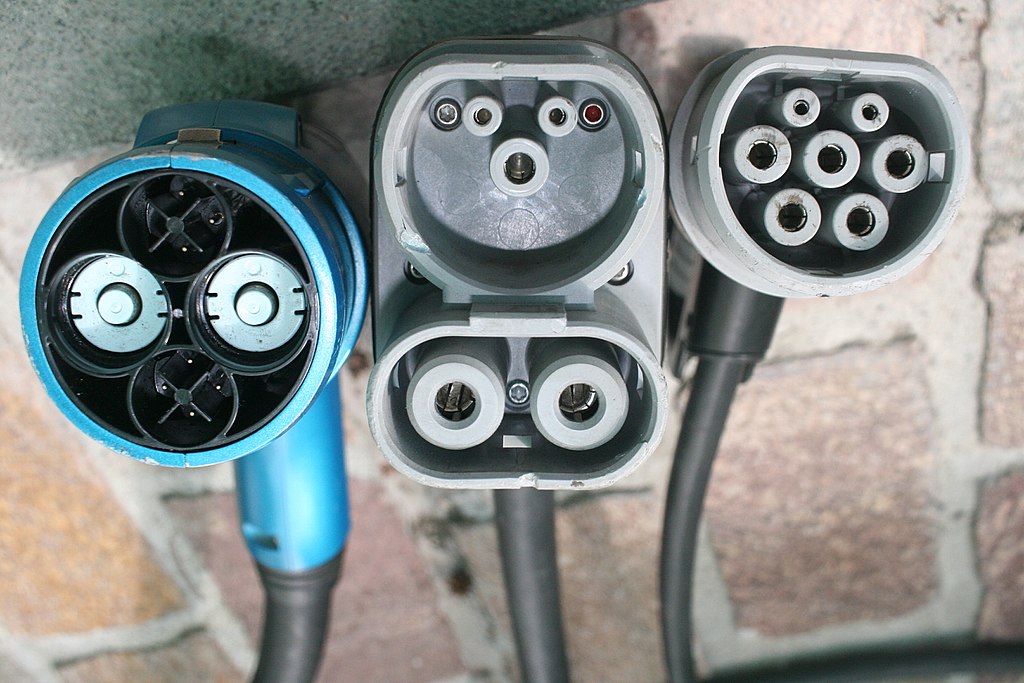 CHAdeMO, Combo2, aand Type 2 EV plugs side by side. 