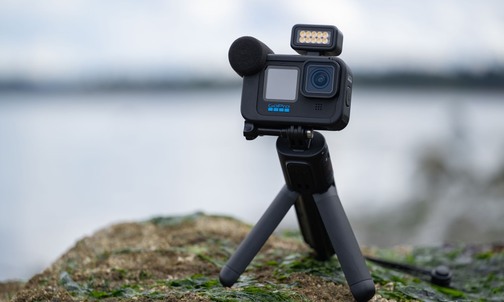 The GoPro Hero 10 Creator Edition on a rock.