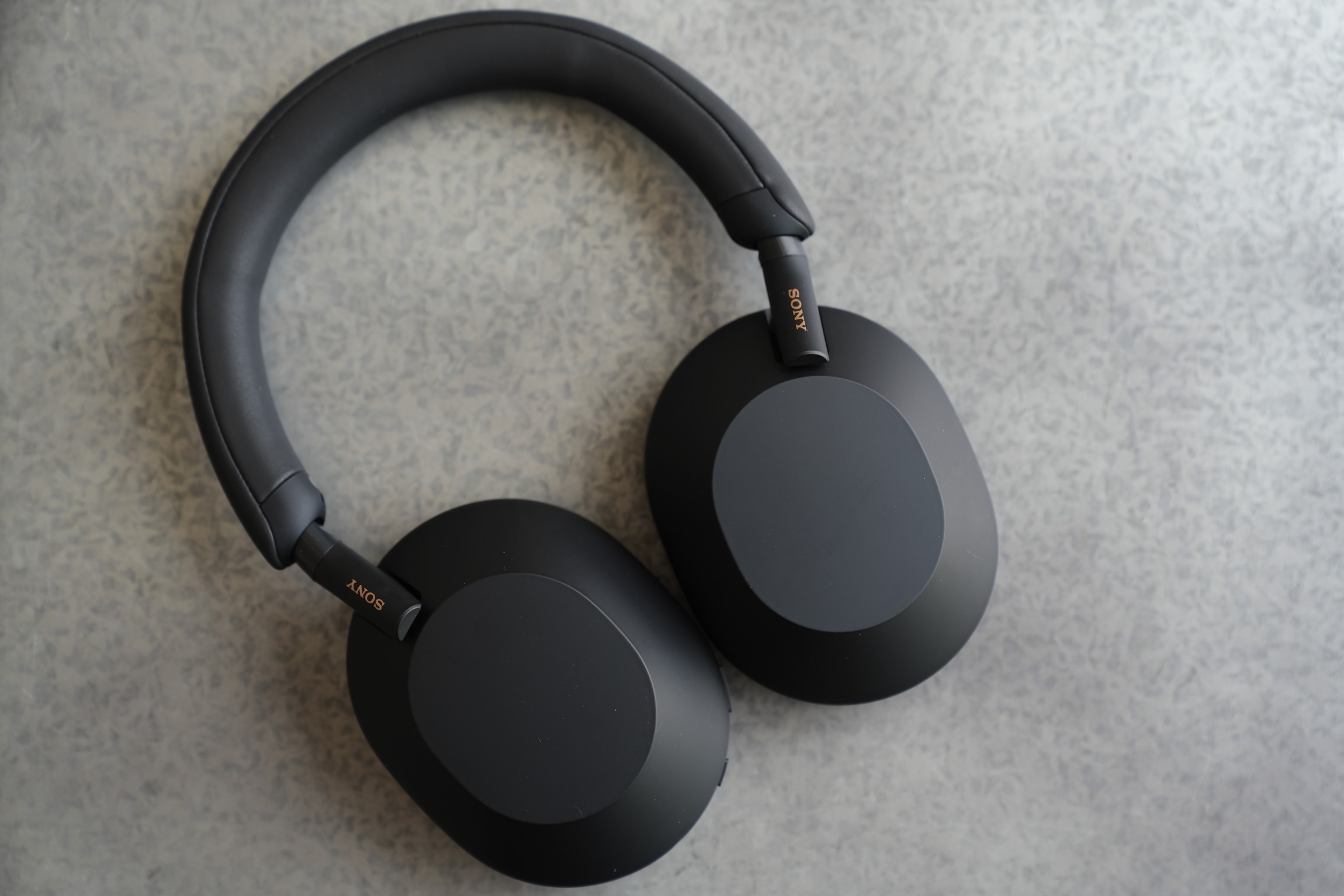 Sony WH-1000XM5 headphones seen in black.
