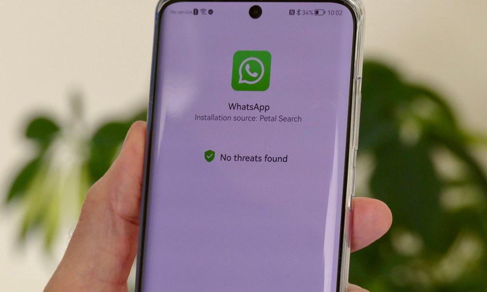 Installing WhatsApp on a Huawei phone using an APK file.