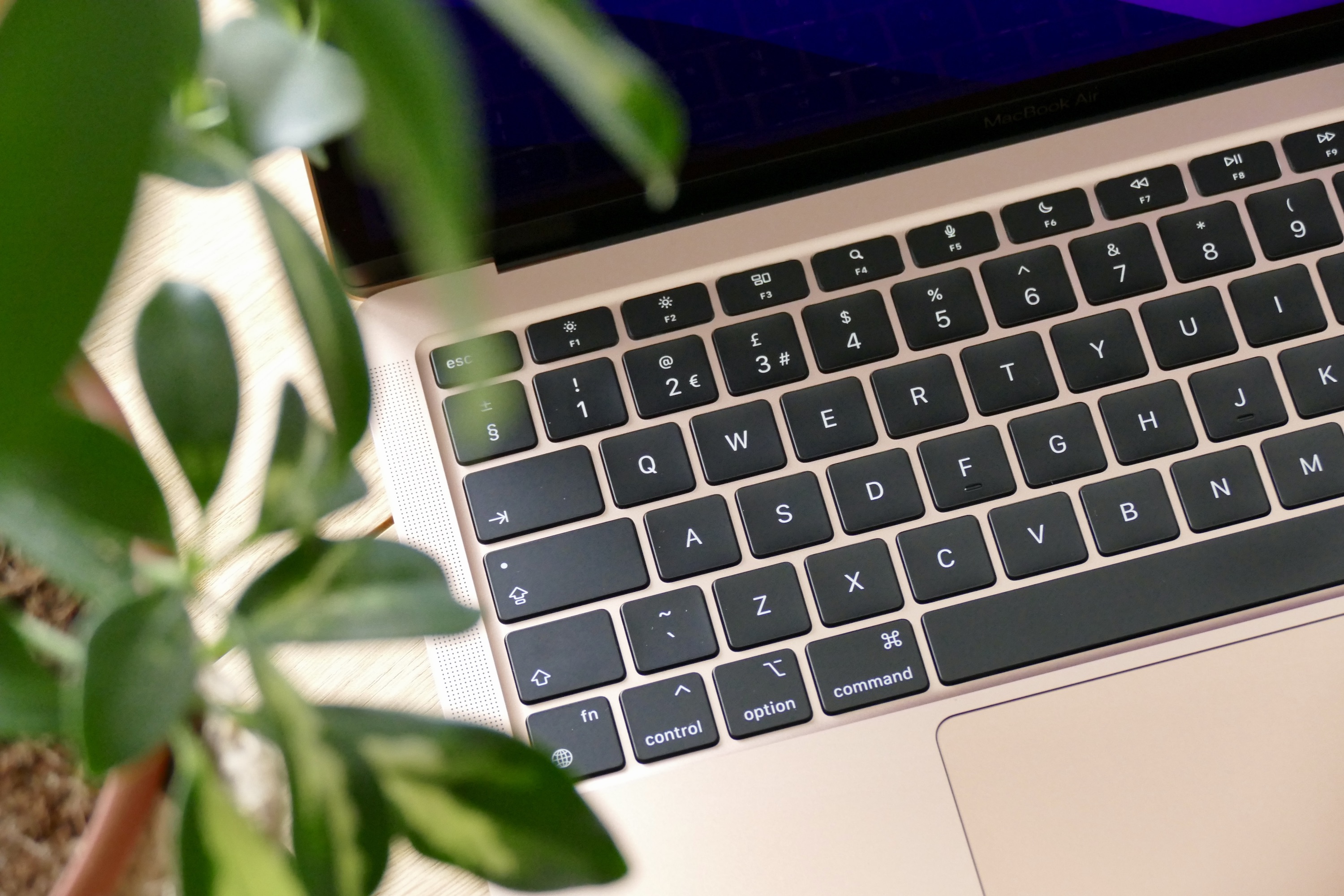 A close-up of the gold MacBook Air M1's keyboard.