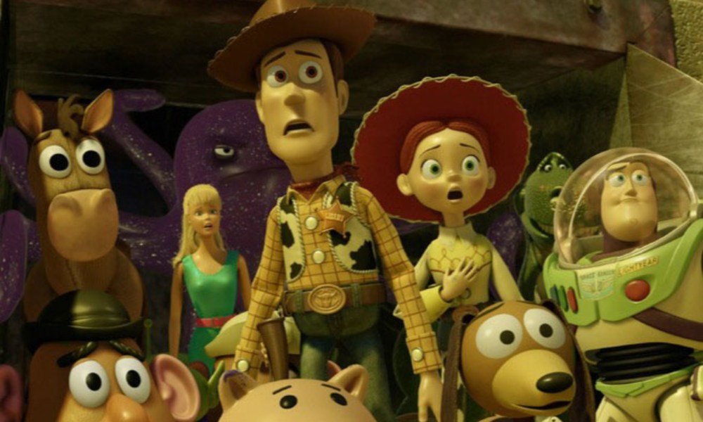 Several toys stare in horror in a scene from the Pixar film "Toy Story 3."