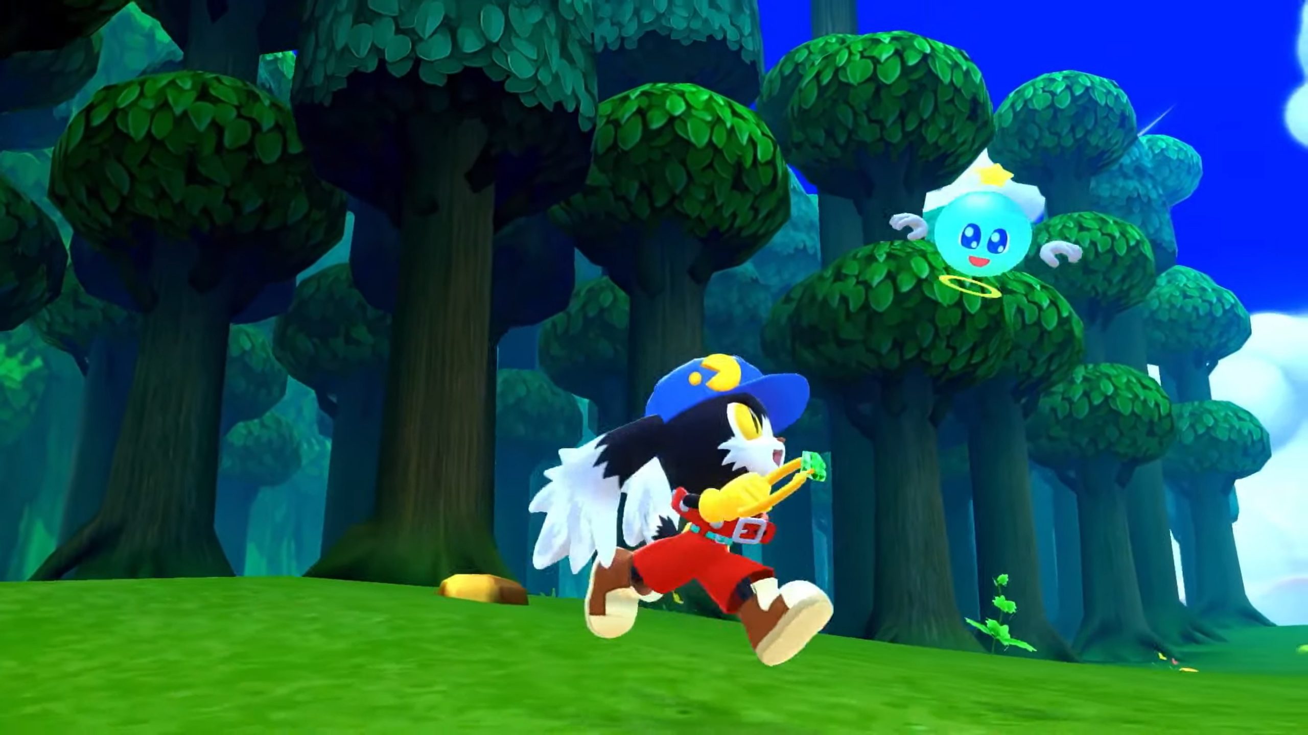 Скриншот из серии Klonoa Phantasy Reverie, где Клоноа бежит рядом с Хьюпоу перед лесом.