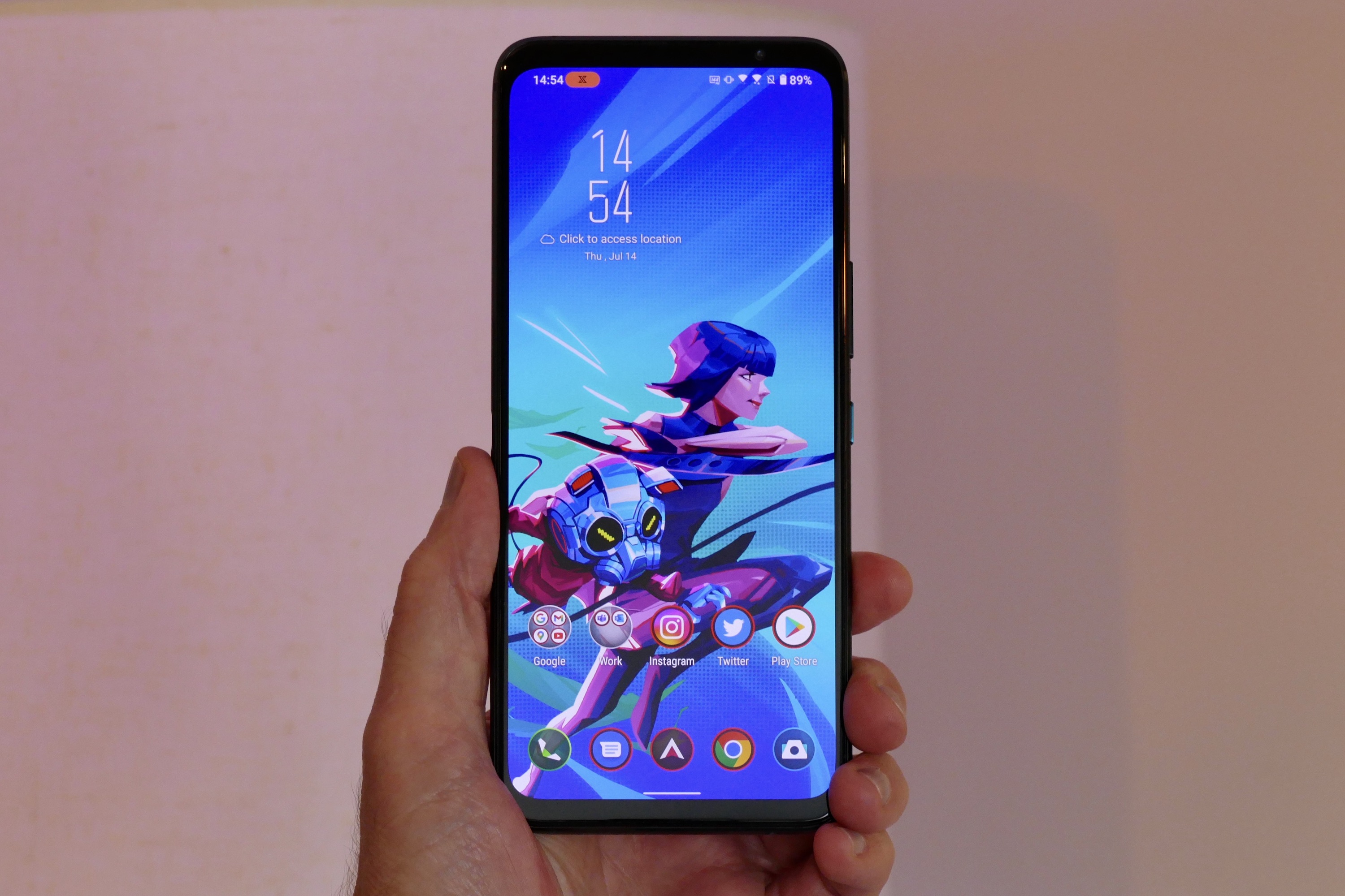 Asus ROG Phone review: The Asus ROG phone costs $900 and has actual buttons  for games - CNET