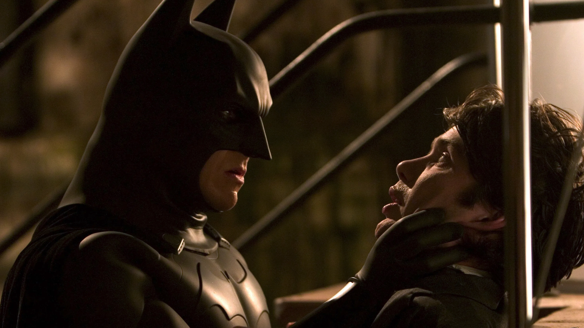 Christian Bale e Cillian Murphy em Batman Begins