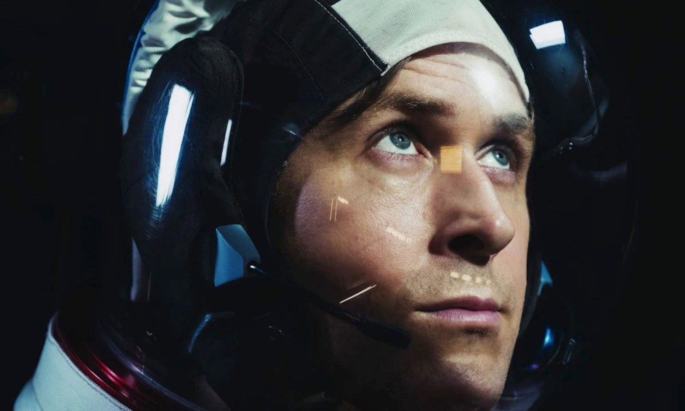 Ryan Gosling looks up in First Man.