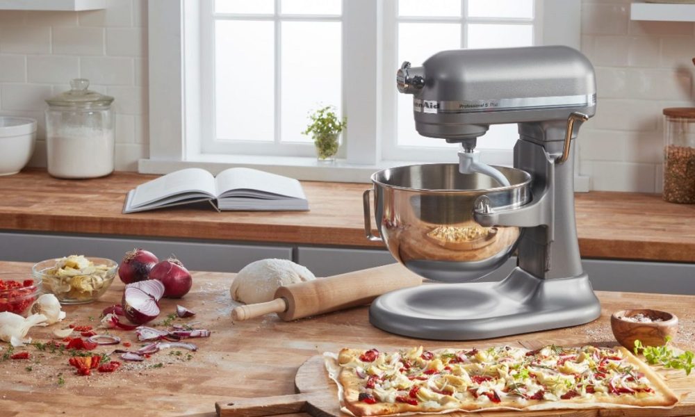 The KitchenAid Pro 5 Plus stand mixer on a kitchen table.