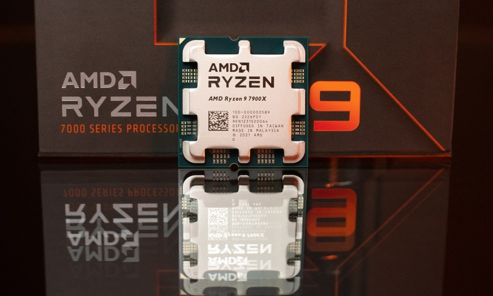 The Ryzen 9 7900X sitting against a box.