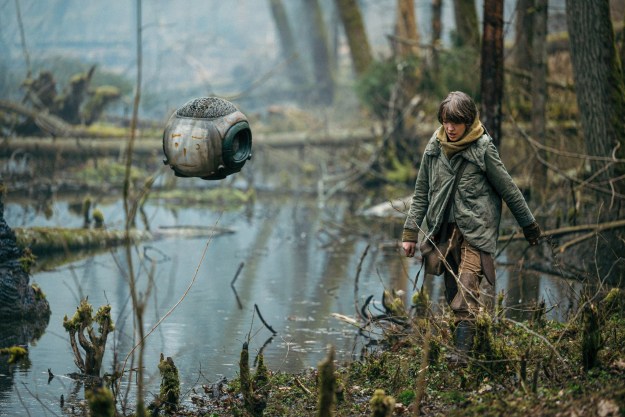 https://www.digitaltrends.com/wp-content/uploads/2022/09/Raffiella-Chapman-walks-through-a-swamp-with-a-floating-robot-in-Vesper.jpg?resize=625%2C417&p=1