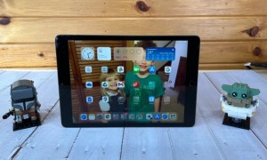 Apple iPad 9th Gen. 2021 on porch with toys.