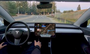 Beta of Tesla's FSD in a car.