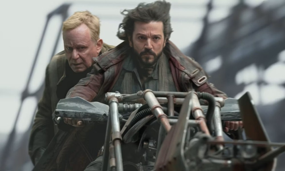 Cassian riding off with Luthen on a speeder in Andor.