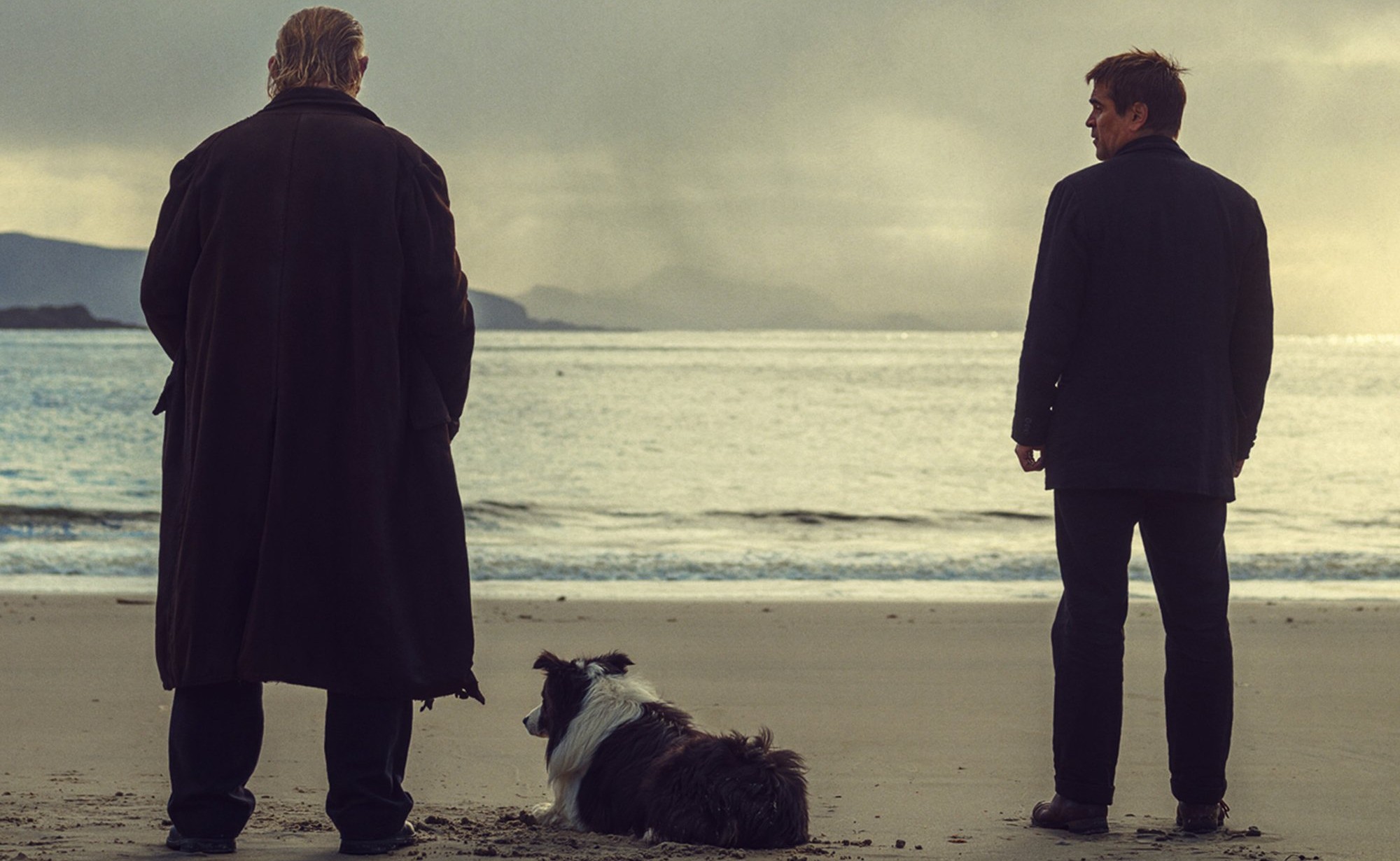 Two men stand on a beach in The Banshees of Inisherin.