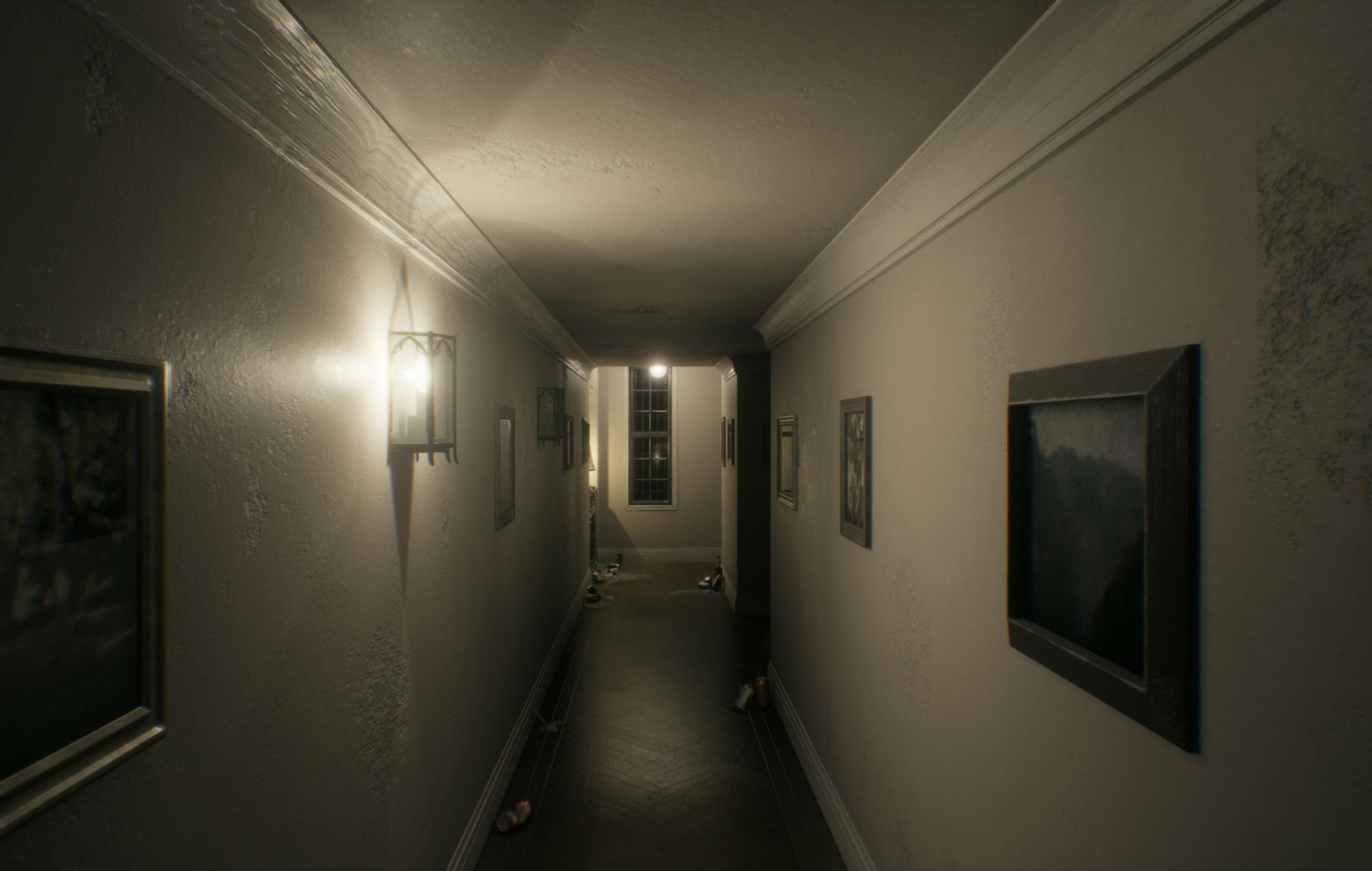 Le couloir était bordé de photos de Silent Hills PT.