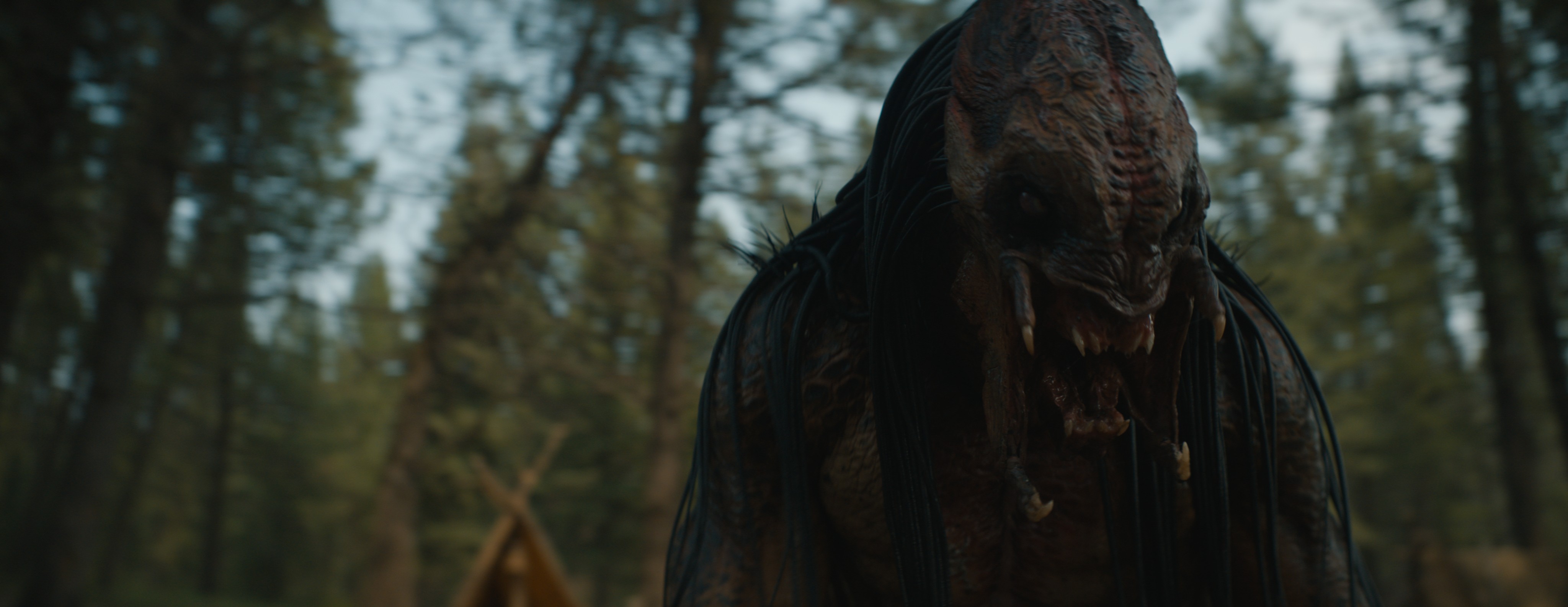 A close-up shot of the Predator's face in Prey, before visual effects are applied.