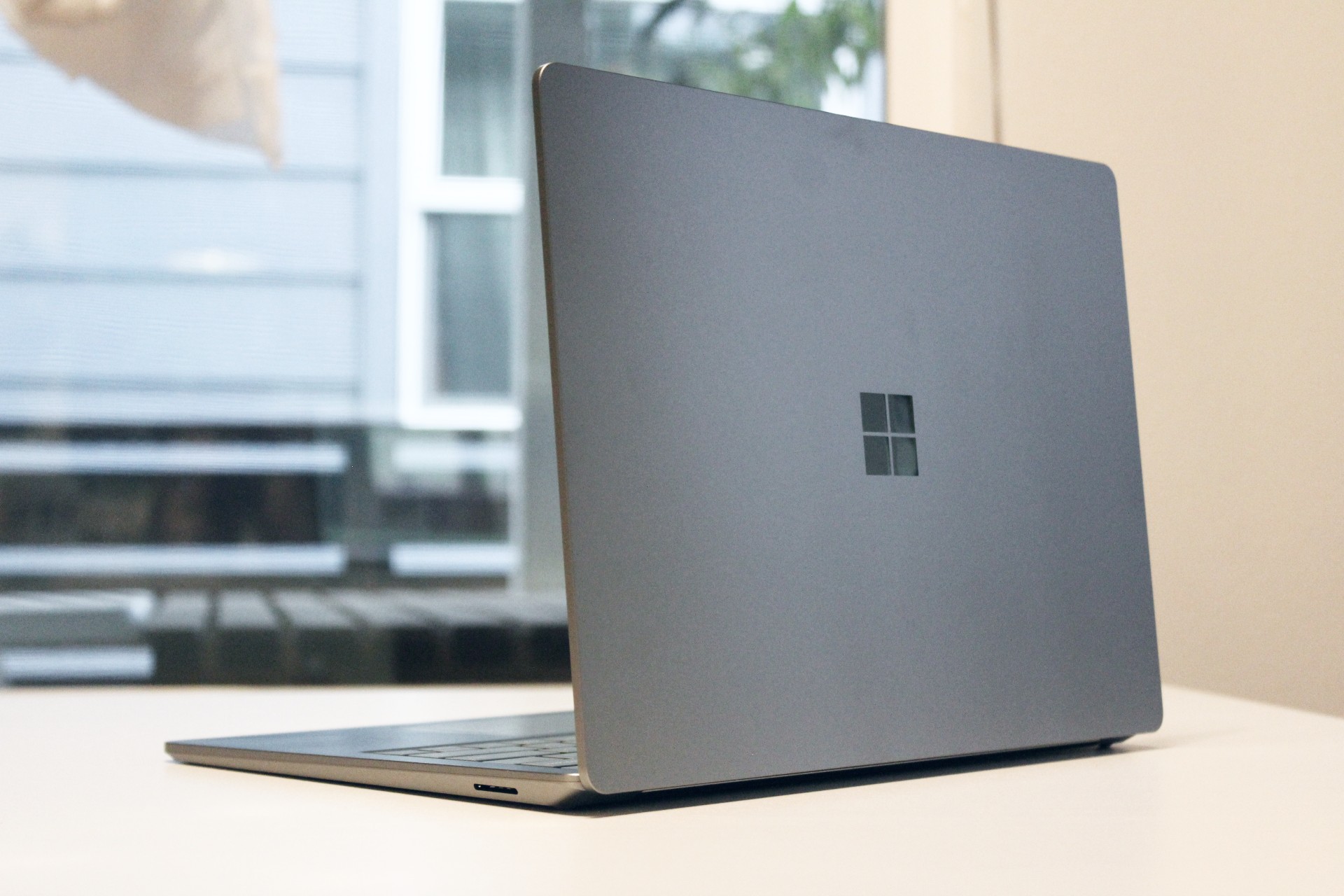 The back lid of the Surface Laptop 5 on a table.