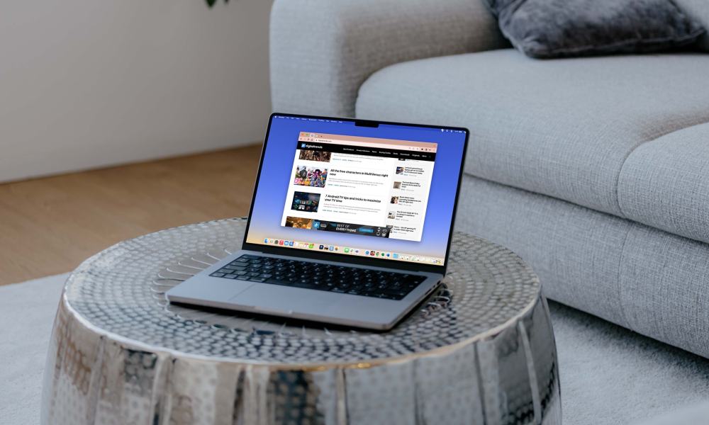 Google Chrome with pinned tabs on a MacBook on a table.