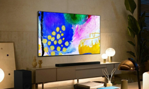 The LG B2 OLED 4K TV in a living room.