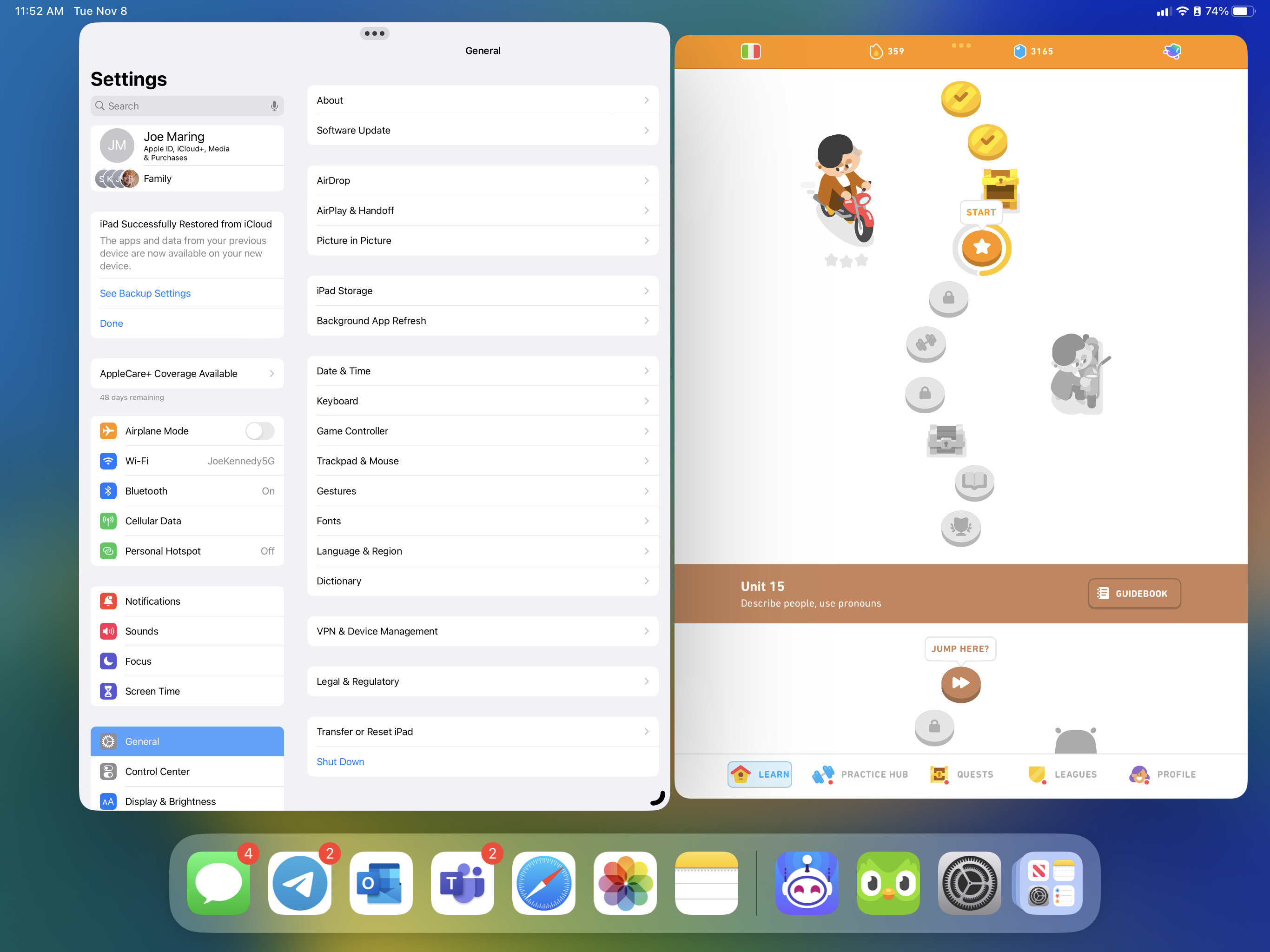 The Settings and Duolingo apps running on an iPad with Stage Manager.