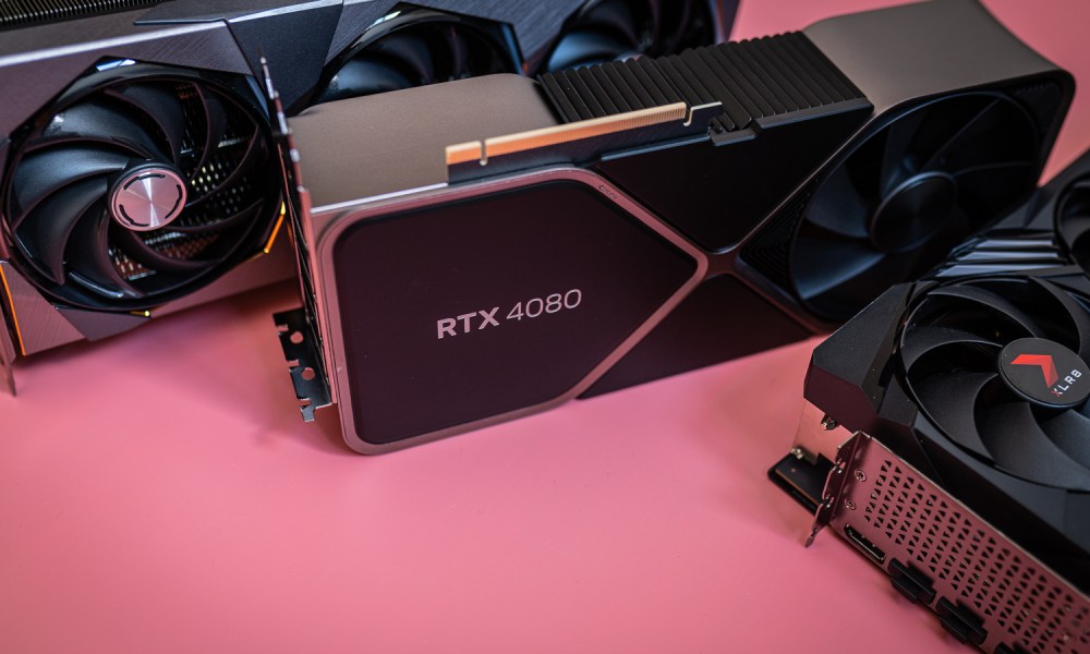 Three RTX 4080 cards sitting on a pink background.