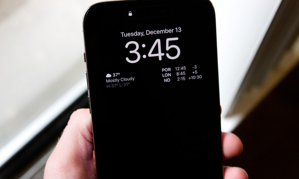 iPhone 14 Pro with a black always-on screen.