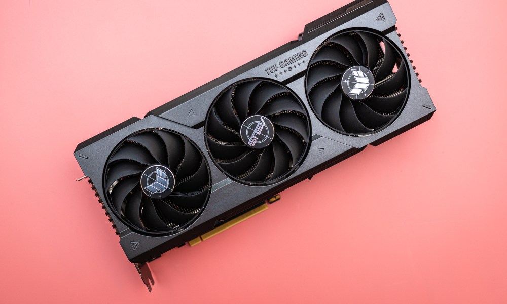 The RTX 4070 Ti graphics card on a pink background.