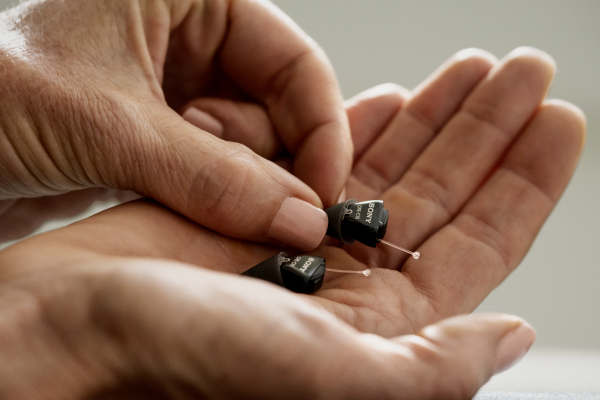 Best Over The Counter Hearing Aids For 2023 Make Big Change   Sony Cre C10 Otc Hearing Aids In Palm 