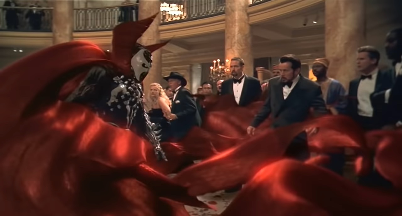 Spawn pousando em um salão de baile em "Spawn".