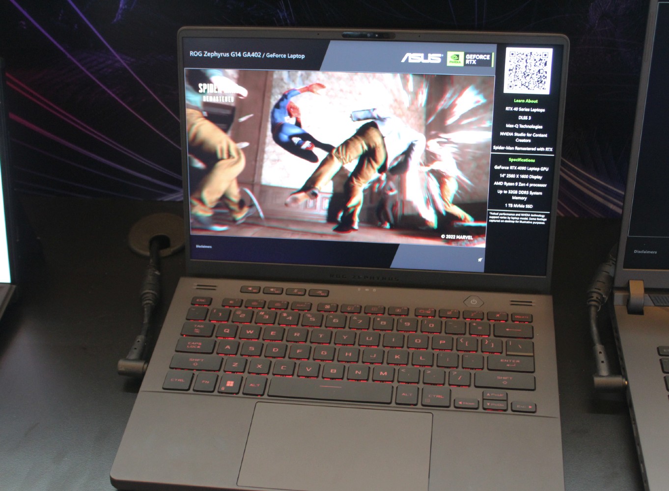 The ROG Zephyrus G14 on a demo table at CES 2023.