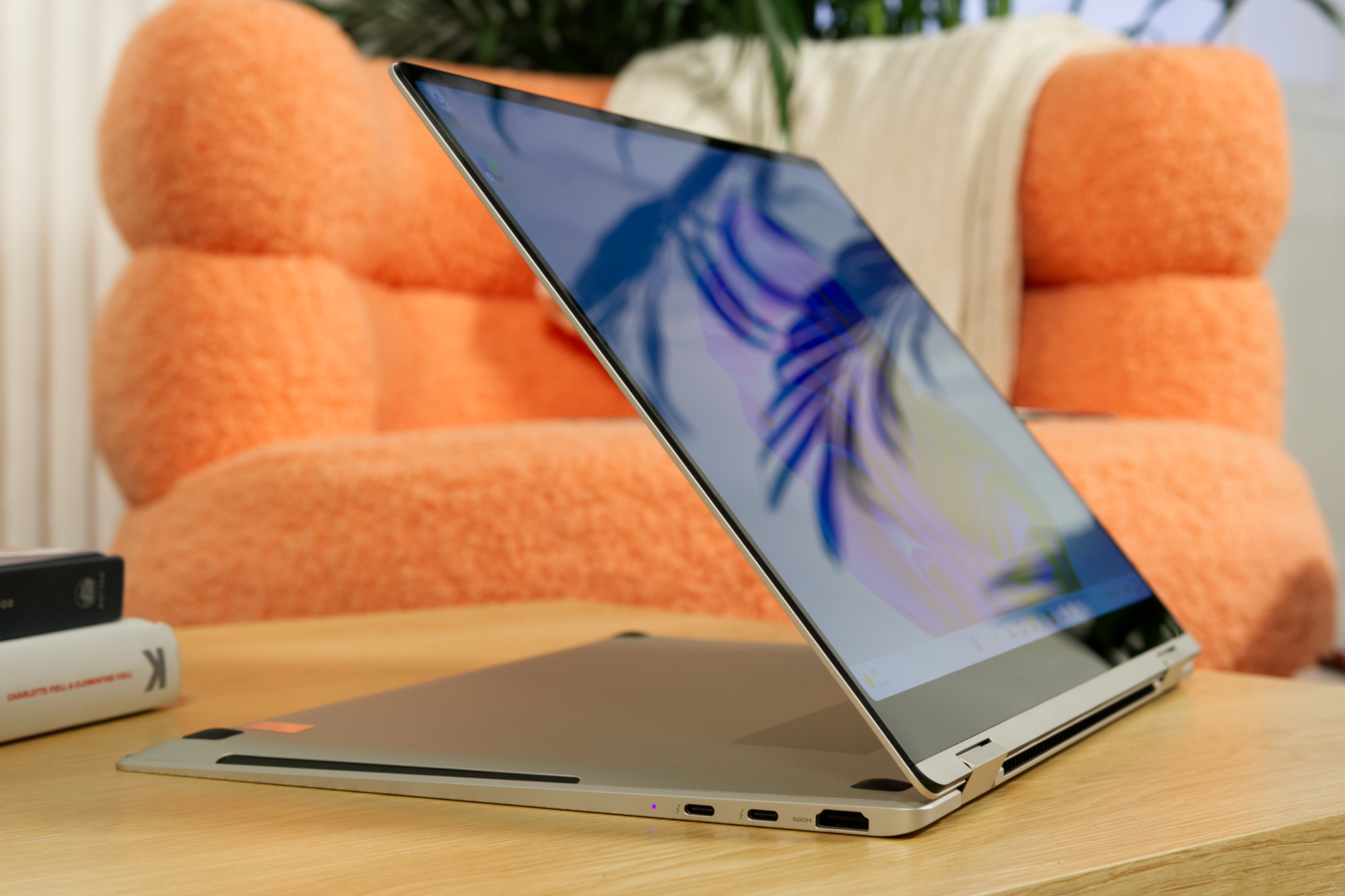 Samsung Galaxy Book 3 Pro 360 propped up on a table with its 360-degree hinge.