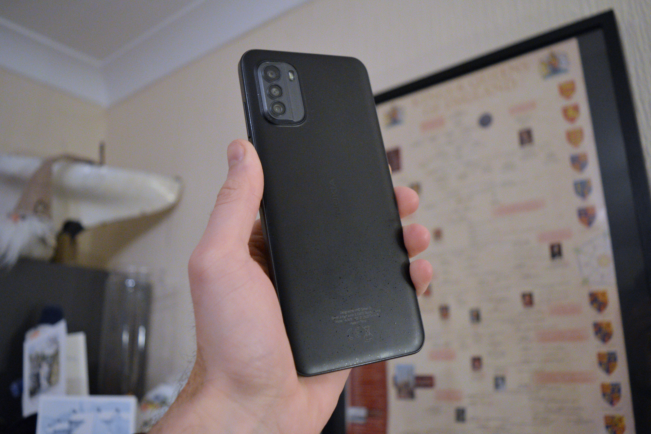 The back of the Nokia G60 5G, held up in a hand.