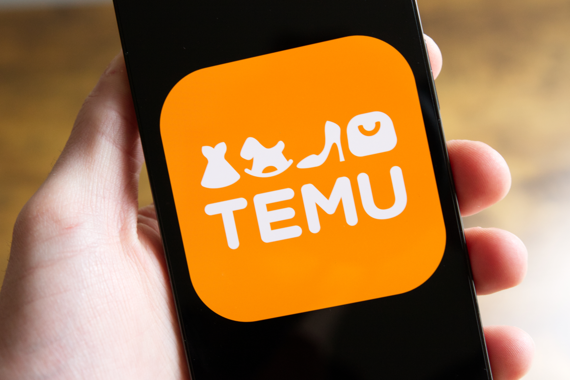 What Makes Temu Unique Standout Features Of The Ultimate Shopping Site   Temu App Icon Logo Phone 