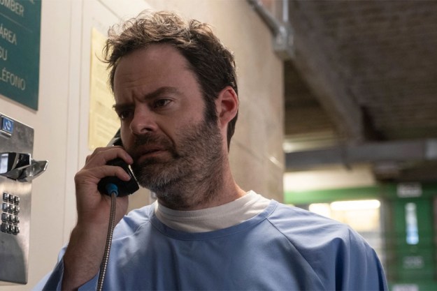 Bill Hader in HBO's Barry in a prison uniform on a payphone.