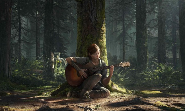 Ellie holds a guitar in the forest in The Last of Us Part 2.