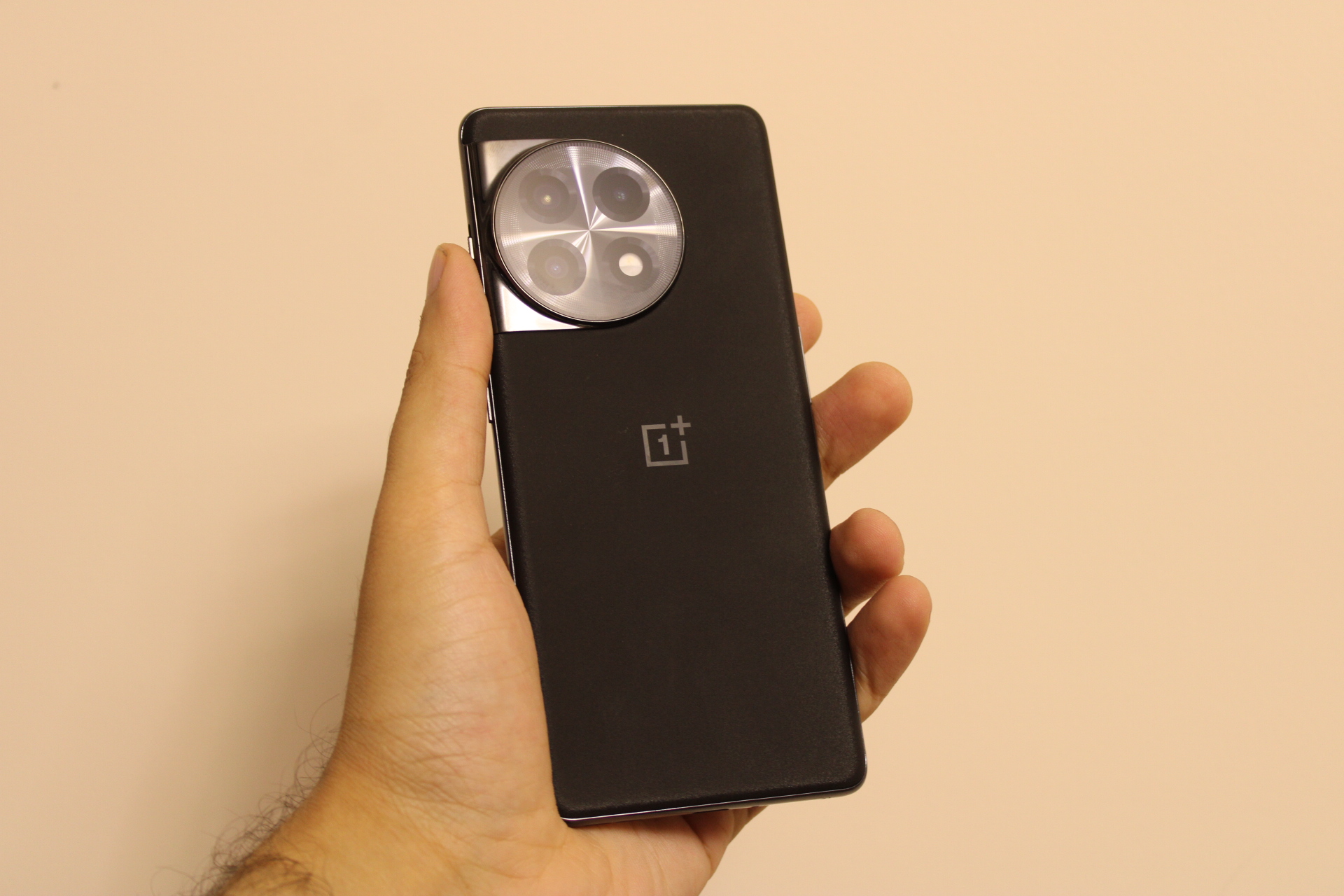 OnePlus 11R in hand.
