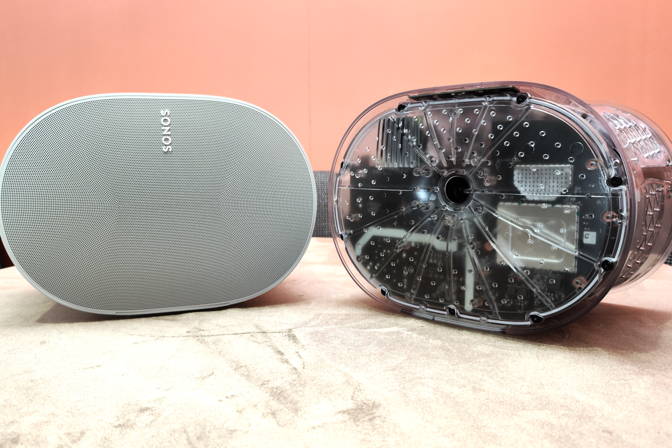 Sonos Era 300, beside a transparent version showing speaker internals.