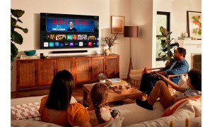 The Vizio 75-inch V-Series TV in a living room environment being watched by the whole family.