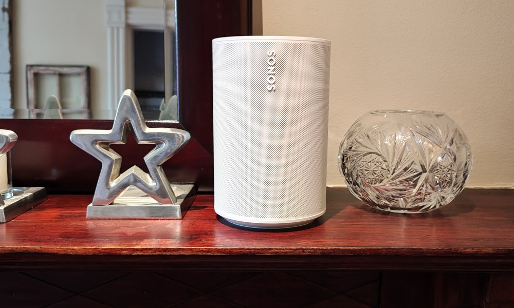 A Sonos Era 100 on a dresser.