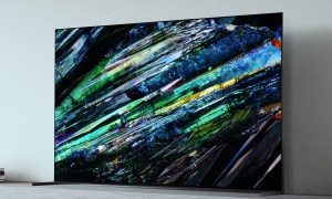 The Sony A95L 4L QD-OLED TV set up on the floor.