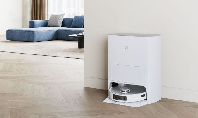 The Ecovacs T20 Omni docked in a living room.