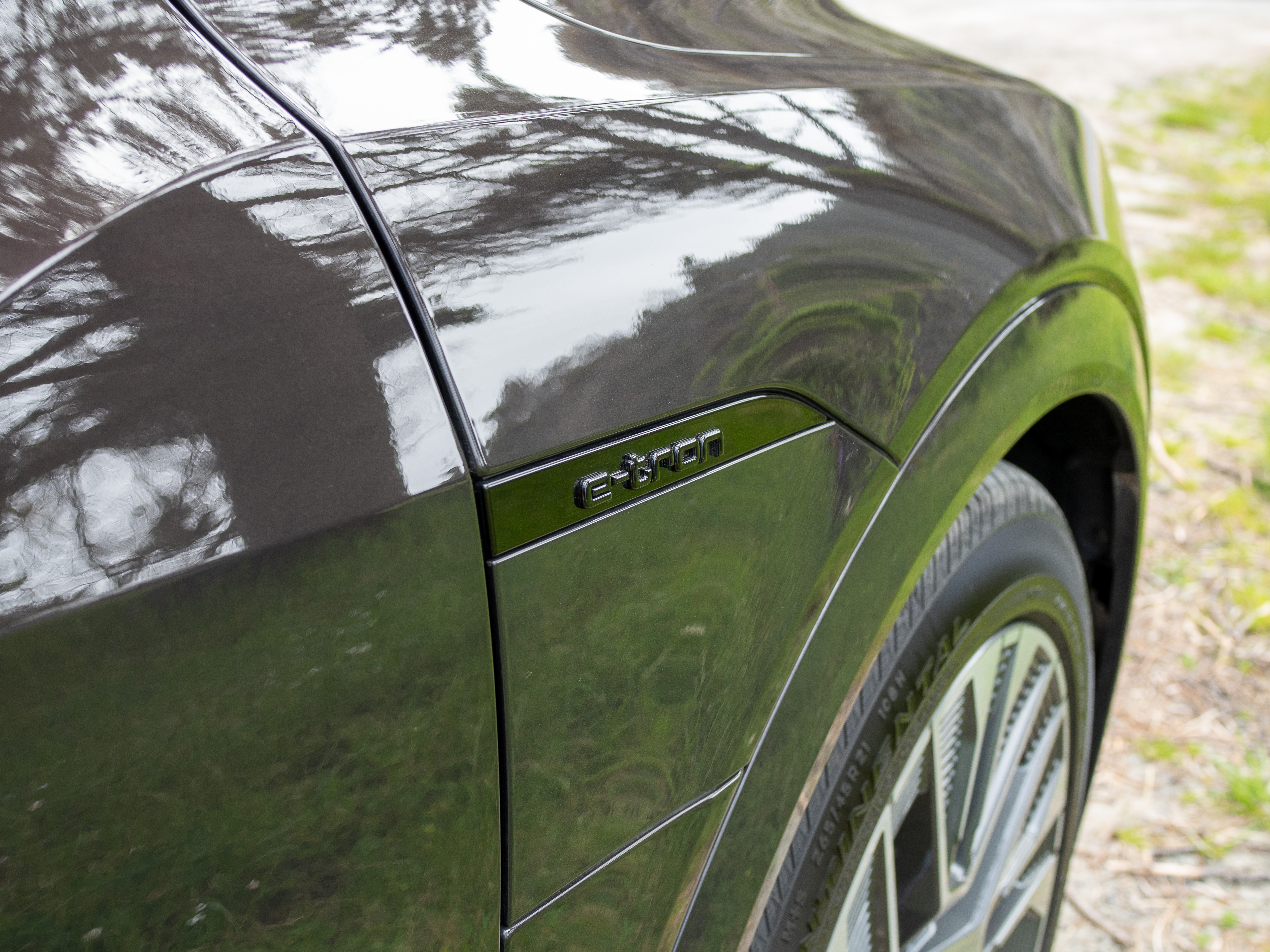 Audi Q8 e-tron in a dark brown color.