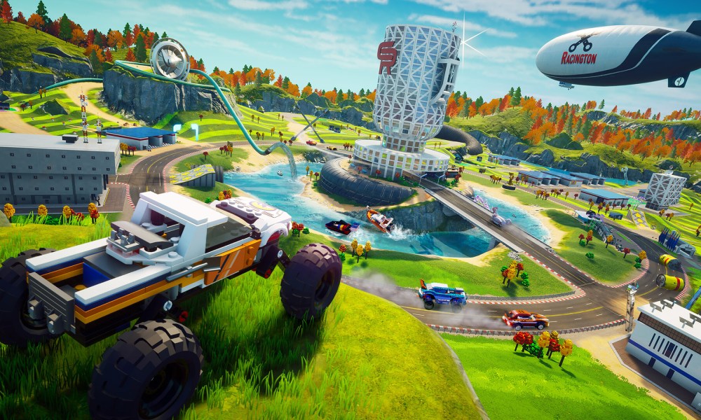 Lego cars drive around a green open world in Lego 2K Drive.