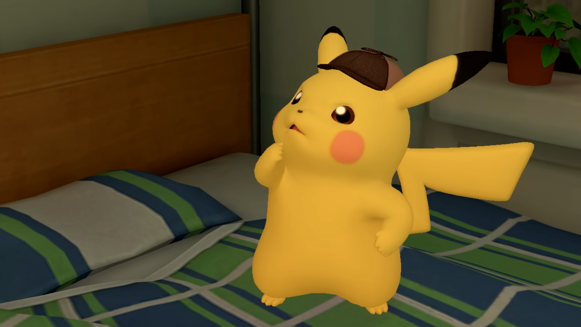 Pikachu detektif berfikir berdiri di atas katil.