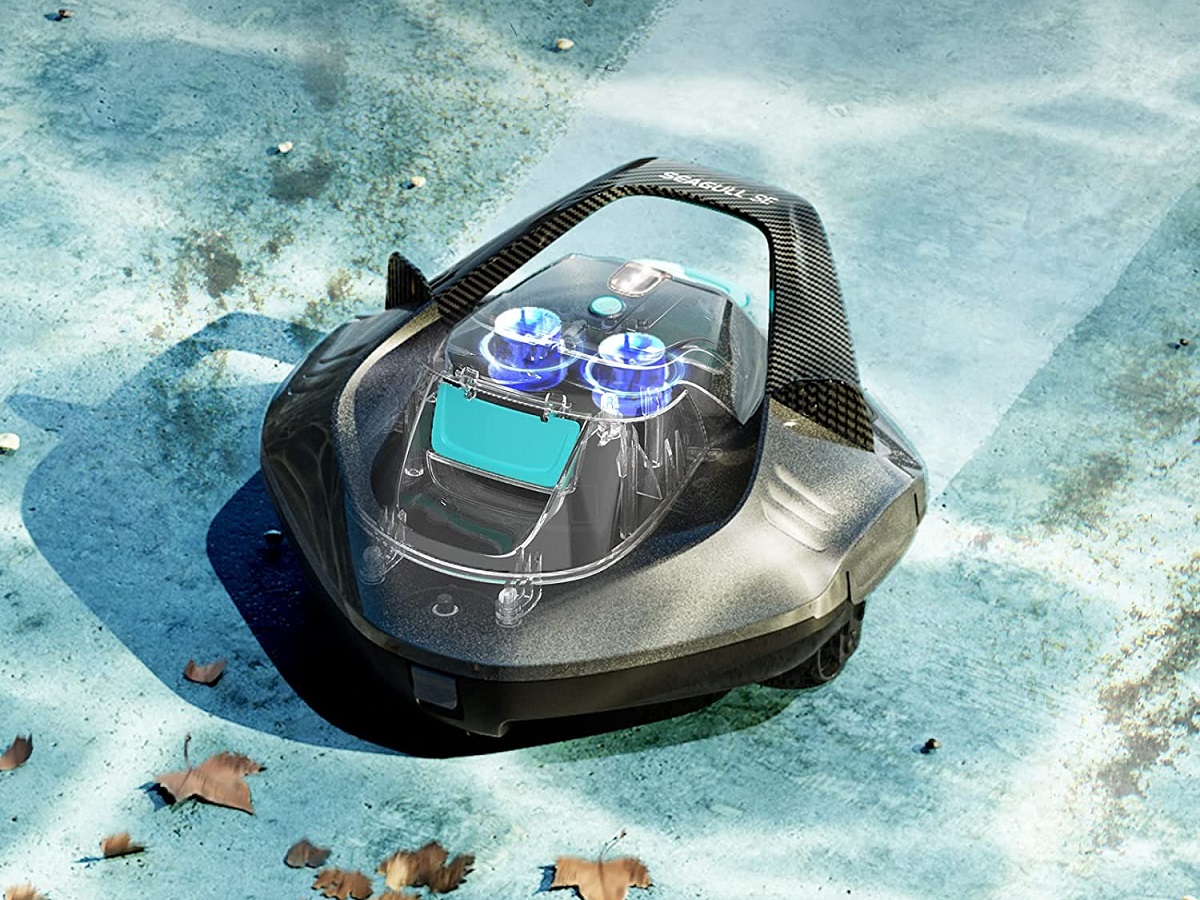 The Airper Seagull SE robotic pool cleaner at the bottom of a swimming pool.