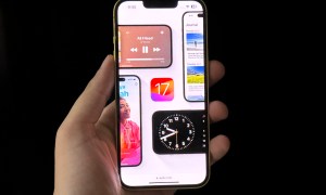 iOS 17 Preview on iPHone display.